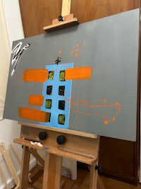 an easel with a painting on it